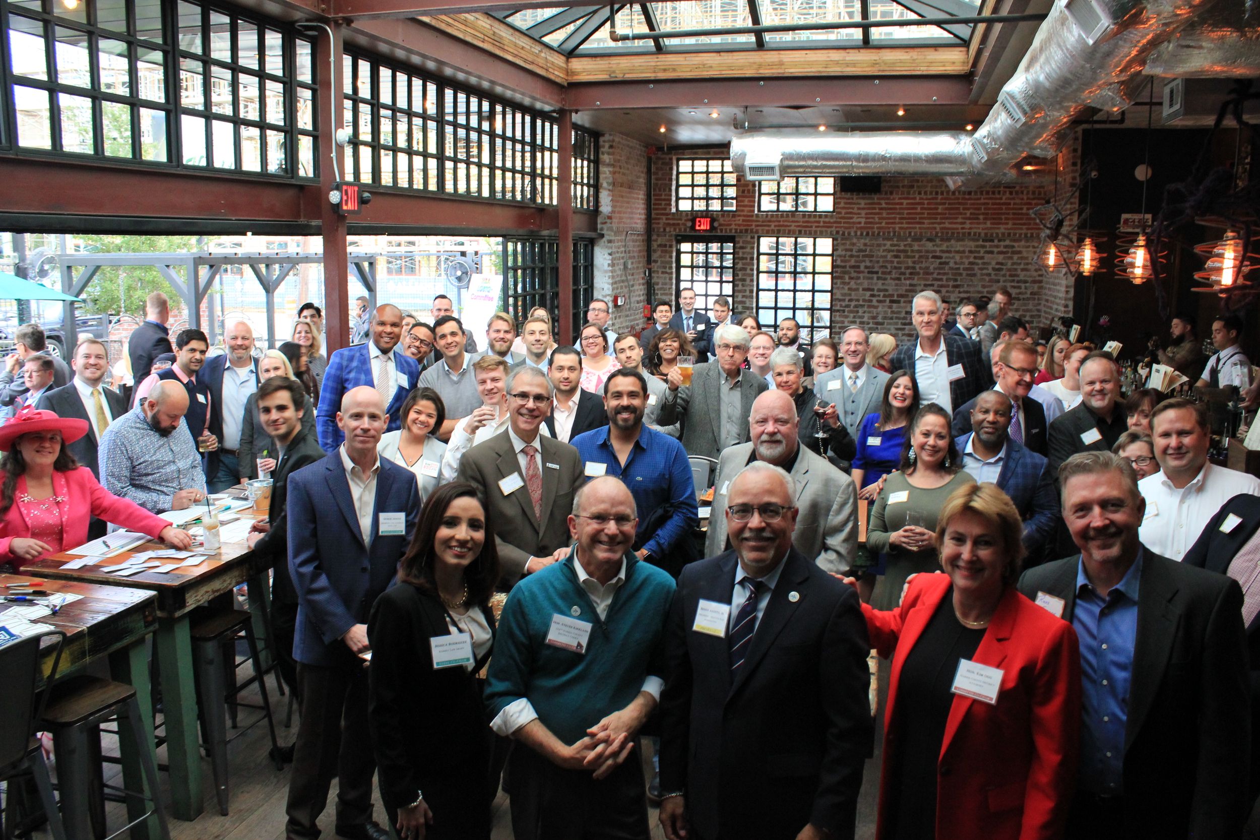 Group photo of attendees at HBA LGBTQ Committee inaugural happy hour