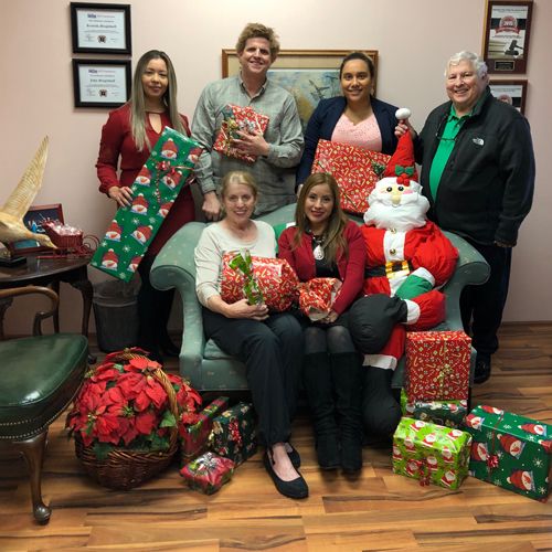 Mingledorff Law Firm with their presents